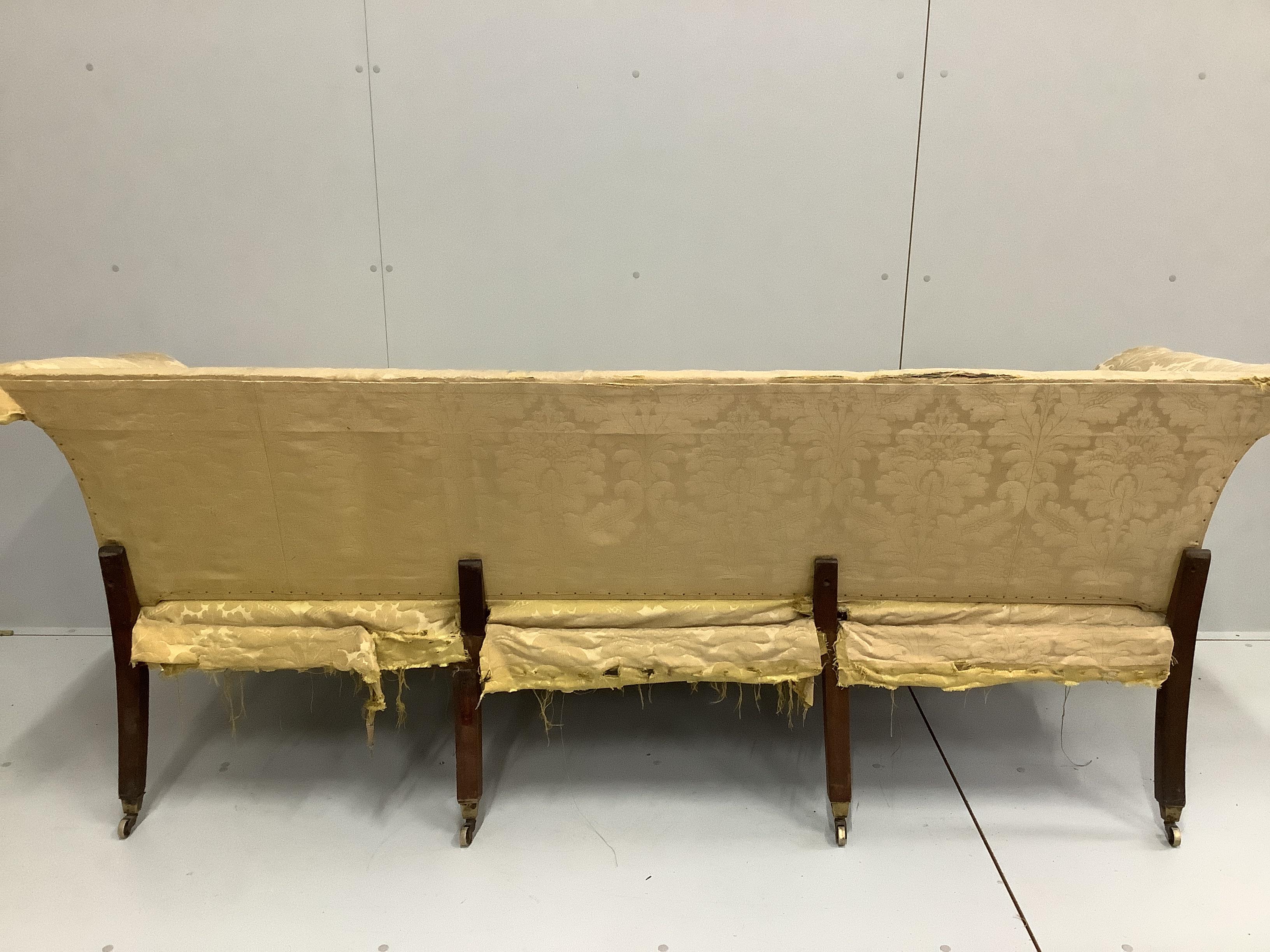 A George III sectional campaign settee on square tapered mahogany legs width 220cm, depth 76cm, height 84cm.